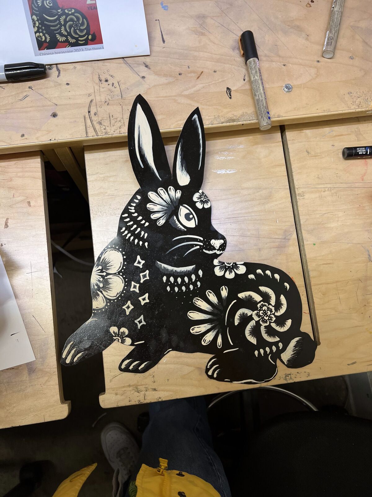 Year of the Rabbit retail sign with a hand-painted rabbit illustration